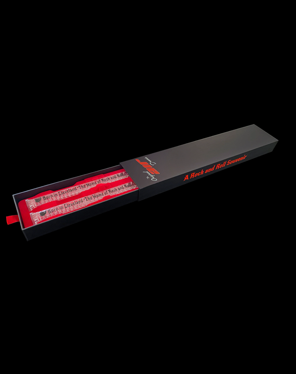 Authentic transparent Original Air Drums sticks in the branded open presentation box
