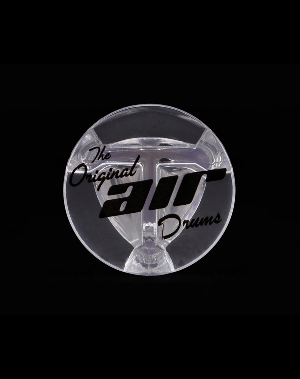 Close-up of a transparent Original Air Drums end cap logo